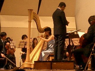 Student Playing Harp