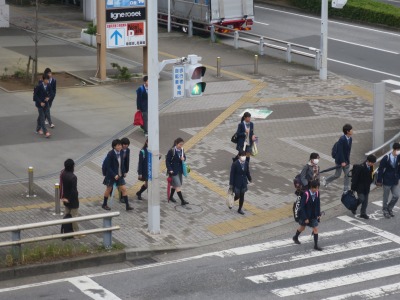 Check the time when children are on their way to school by the teachers