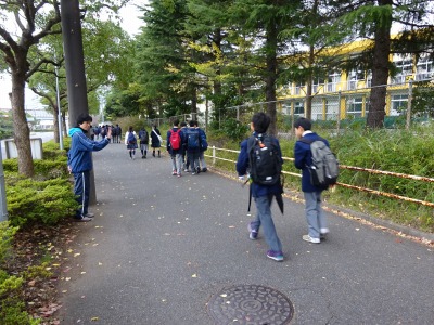 Check the time when children are on their way to school by the teachers